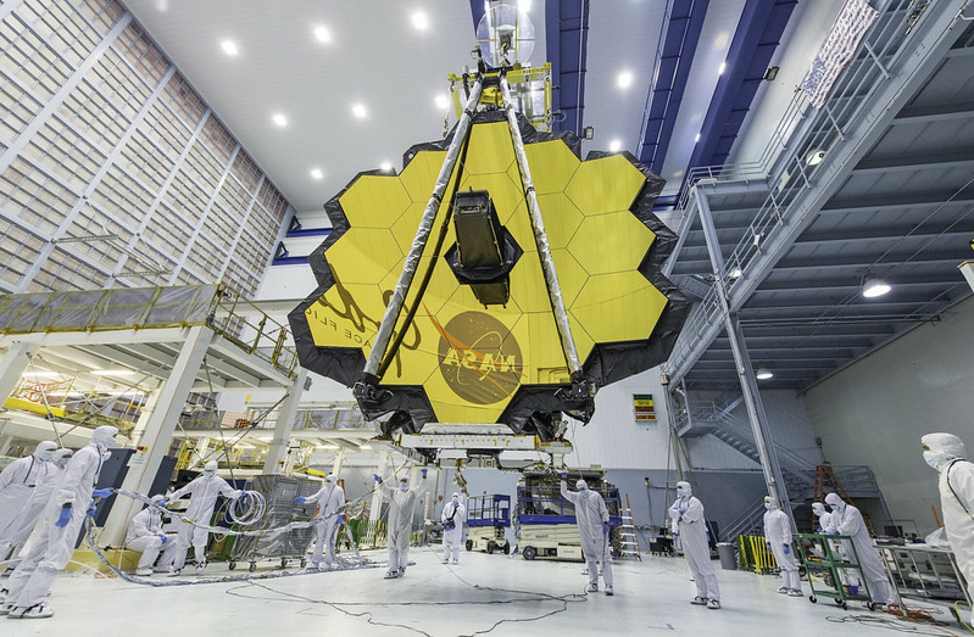Engineers are working on the James Webb Space Telescope's giant gold-coated mirror.
