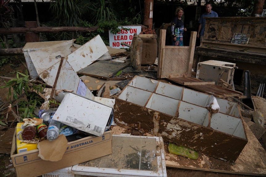 Items such as bookshelves, wooden chairs and signs were destroyed and mixed in with the trash.