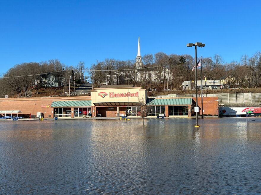 As raging Kennebec River recedes, chaotic cleanup begins in riverside business district