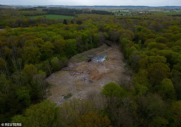 Drone footage of Hoad's Wood in Kent, filled with mountains of commercial waste