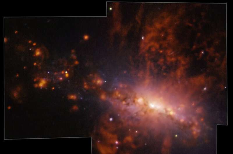 Huge galactic explosion exposes ongoing galactic pollution