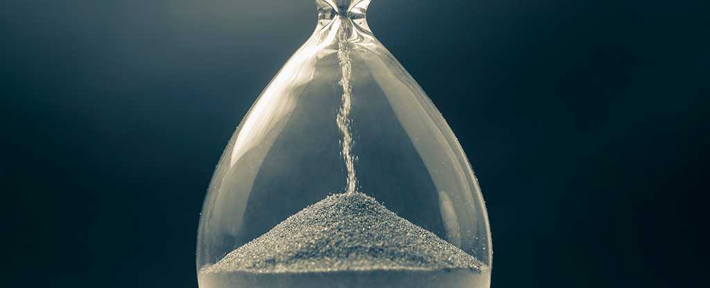 Physicists finally explain how sand in an hourglass suddenly stops flowing