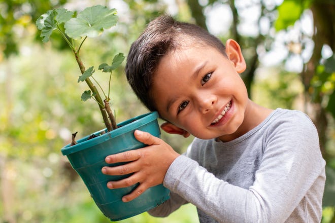 Small plants make a big future: Children celebrate Earth Day with gifts to nature