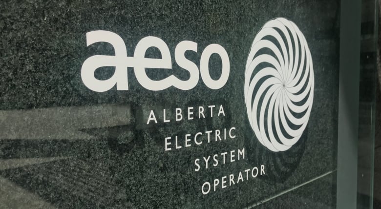 Picture of a marble plaque that says AESO