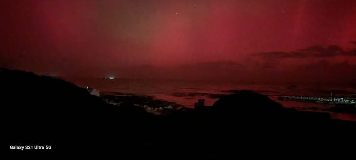 Southern African skies illuminated by aurora as historic solar storm collides with Earth